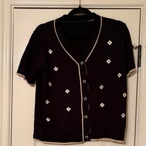 Black Cardigan with White Floral Accents